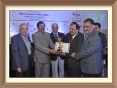 Shri Shripad Yesso Naik, Hon`ble Minister of State (Independent Charge) for AYUSH and Minister of State for Health and Family Affairs, Government of India awarded NSIC with ASSOCHAM -ICAI "Most Promising Brand" Award at the 3rd SME Excellence Award 2015 held during the Seminar on Financial Inclusion for Entrepreneurship and Innovation on 10th Dec 2015. The Award was received by Shri Gaurang Dixit, General Manager (SG), NSIC and Shri Manoj Lal, General Manager, NSIC on behalf of National Small Industries Corporation. Also, present on this occasion were Shri M. P. Raiker, Co-Chairman, National Council for MSMEs (ASSOCHAM), Shri V.Sharma, Central Council Member, ICAI, Shri Salil Chaturvedi, Director, SME Rating, CRISIL and Shri S. C. Aggarwal, Chairman, Micro Finance Council, ASSOCHAM and various members of Industrial Associations and Chamber of Commerce.