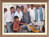 Sh. Kalraj Mishra, Hon’ble Minister for MSME distributed aids & equipments to differently abled persons in Deoria under CSR initiatives of NSIC. On this occasion Sh. Ravindra Nath, CMD, NSIC, Sh. Ravindra Kushwaha, Member of Parliament (Lok Sabha) – Salempur (U.P.), Sh. Janmejai Singh, MLA, Deoria were also present.

<a target="_blank"  href="https://www.facebook.com/NSICLTD/photos/pcb.1062792930425386/1062791700425509/?type=3&theater"><font color="#FF6600">Click here to view  more images.</font></a>
<img ALIGN=right src=/images/61annyear.jpg  height=80 WIDTH=90
