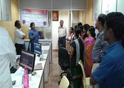 Officials of NSIC, Branch Office, Peenya, Bangalore visited M/s.Dollar Industries and briefed their 20 - 25 employees w.r.t Cashless Transactions on 19-12-2016.