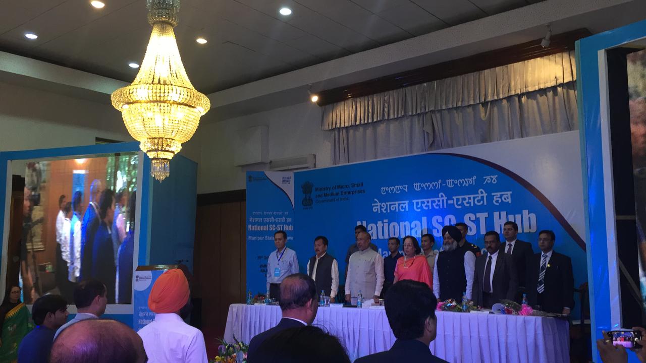 The National Small Industries Corporation Ltd.- NSIC organized a National SC/ST Hub conclave at Imphal, Manipur on 20.10.2018. Hon’ble Dr. Najma A. Heptulla, Governor of Manipur was the Chief Guest. Chief Minister of Manipur Hon’ble Sh. Nongthombam Biren Singh was the Special Guest of Honour and Sh. N. Kayiisi, Hon’ble Minister of Tribal Affairs was the Guest of Honour. Other dignitaries present on the Dias were Sh. L. Haokip Director SME, Ministry of MSME ,Sh. P. Udayakumar, Director (Planning & Marketing) NSIC, Sh. Inder Iqbal Singh Atwal, National working President-Forum of SC ST Legislature & Parliamentarians, and Sh. K.S. Siddique, Zonal General Manager, NSIC (North East region).
A Presentation was given by Sh. L. Haokip Director SME, Ministry of MSME highlighting the various initiatives taken by Ministry of MSME. A NSSH film in regional language was then played. A session on Central/State Govt. schemes was chaired by Sh. L. Haokip, Director SME in which officials of KVIC, MSME-DI, Imphal, IIM Vishakhapatnam, NEDFI, NERCOM were present.This session focused on various Govt. initiatives such as CGTMSE, MAS, CLCSS etc. Another session with procurement agencies and Banks was held which was chaired by Sh. P. Udayakumar, Director (Planning & Marketing) NSIC. Officials of various Banks and CRPF, 2nd command Assam Riffle, NHPC shared their views during the session.Senior officers from Govt. of Manipur were also present during the event. The program was a great success and attended by more than 590 SC-ST participants.
